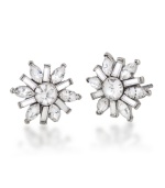 Winter wonderland. Add festive, fashionable flair to your style with Carolee's sparkling snowflake-shaped button earrings. Embellished with glittering glass accents, they're crafted in silver tone mixed metal. Approximate diameter: 1/2 inch.