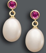 A sweet touch of femininity. These polished drops combine cultured freshwater pearls (8-1/2-9 mm) with round-cut amethyst (1/2 ct. t.w.) in a 14k gold bezel setting. Approximate drop: 3/4 inch.