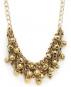 INC International Concepts goes for the gold motif with its bib necklace. Crafted from 12k gold-plated mixed metal, the necklace is also accented with gold-tone glass stones. Approximate length: 18 inches + 2 inch extender. Approximate drop: 2 inches.