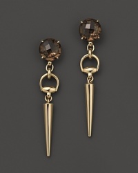 At once edgy and glamorous, these 18K yellow gold Gucci earrings show off a spiked shape accented with smokey quartz. At once edgy and glamorous, these 18K yellow gold Gucci earrings show off a spiked shape accented with smokey quartz.