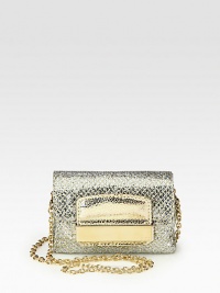 A dazzling evening accessory wrapped in glittery fabric with a distinct metal plaque on the front.Crossbody chain, 23 drop Zip closure underneath the flap One inside open pocket Fully lined 53% cotton/26% nylon/18% PVC/3% polyester 5W X 4H X 2D Made in Italy A dazzling evening accessory wrapped in glittery fabric with a distinct metal plaque on the front.Crossbody chain, 23 drop Zip closure underneath the flap One inside open pocket Fully lined 53% cotton/26% nylon/18% PVC/3% polyester 5W X 4H X 2D Made in Italy