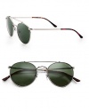 Small-frame metal sunglasses take a fresh approach to a cool vintage look. Available in matte silver frames with crystal green lenses.Metal100% UV ProtectionMade in Italy