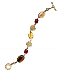 Just bead it. This vintage style from Lauren Ralph Lauren features semi-precious tiger's eye stones, resin beads and gold tone charms. Set in antique 14k gold-plated mixed metal with toggle closure. Approximate length: 7-1/2 inches. Just bead it. This vintage style from Lauren Ralph Lauren features semi-precious tiger's eye stones, resin beads and gold tone charms. Set in antique 14k gold-plated mixed metal with toggle closure. Approximate length: 7-1/2 inches.