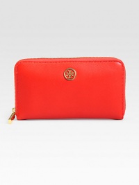A luxurious saffiano leather design with an logo emblem.Zip-around closureOne inside zip pocketEight credit card slotsTwo bill compartmentsLeather lining7½W X 4H X ¾DImported A luxurious saffiano leather design with an logo emblem.Zip-around closureOne inside zip pocketEight credit card slotsTwo bill compartmentsLeather lining7½W X 4H X ¾DImported