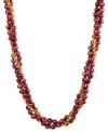 Go for a subtle hint of color. This beautiful necklace features cranberry-colored cultured freshwater pearls (6-7 mm) set in 18k gold over sterling silver. Approximate length: 18 inches.