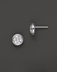 White gold bezel-set diamond stud earrings. With signature ruby accent. Designed by Roberto Coin. White gold bezel-set diamond stud earrings. With signature ruby accent. Designed by Roberto Coin.