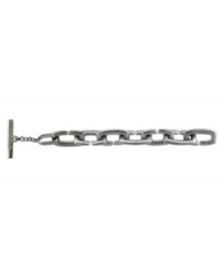 Sometimes, a simple layer is all you need to create a polished look. Vince Camuto's sophisticated Kiss bracelet provides just that touch with oval-shaped links and a chic toggle clasp in silver tone mixed metal. Approximate length: 8 inches. Sometimes, a simple layer is all you need to create a polished look. Vince Camuto's sophisticated Kiss bracelet provides just that touch with oval-shaped links and a chic toggle clasp in silver tone mixed metal. Approximate length: 8 inches.