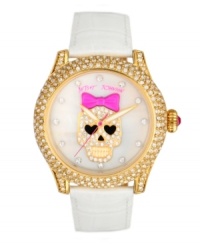 Cuteness to die for. Watch by Betsey Johnson crafted of white croc-embossed leather strap and round polished gold tone stainless steel case covered in crystal accents. White mother-of-pearl dial features crystal accent markers, large gold tone skull with pink bow and crystal accents at center, gold tone hour and minute hands, signature fuchsia second hand and logo. Quartz movement. Water resistant to 30 meters. Two-year limited warranty. Cuteness to die for. Watch by Betsey Johnson crafted of white croc-embossed leather strap and round polished gold tone stainless steel case covered in crystal accents. White mother-of-pearl dial features crystal accent markers, large gold tone skull with pink bow and crystal accents at center, gold tone hour and minute hands, signature fuchsia second hand and logo. Quartz movement. Water resistant to 30 meters. Two-year limited warranty.