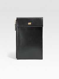 A stylish travel companion with all of the necessary compartments to store your boarding pass, passport, credit cards, money and other important documents, crafted in soft Italian calfskin leather.Zip, snap button closureWrist strapOne bill compartmentSix card slots6W x 8HLeatherMade in Italy A stylish travel companion with all of the necessary compartments to store your boarding pass, passport, credit cards, money and other important documents, crafted in soft Italian calfskin leather.Zip, snap button closureWrist strapOne bill compartmentSix card slots6W x 8HLeatherMade in Italy
