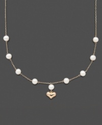 For the little girl who has stolen your heart. This illusion necklace features cultured freshwater pearls (5-6 mm) with a 14k gold dangling heart charm. Set in 14k gold. Approximate length: 13 inches. Approximate drop: 1/2 inch. For the little girl who has stolen your heart. This illusion necklace features cultured freshwater pearls (5-6 mm) with a 14k gold dangling heart charm. Set in 14k gold. Approximate length: 13 inches. Approximate drop: 1/2 inch.