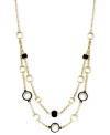 Be bold with some help from Anne Klein. This beaded necklace highlights plastic jet and pearl accents. Crafted in gold tone mixed metal. Approximate length: 16 inches + 2-inch extender.