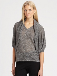 A brilliant jersey shrug with a hint of metallic thread that creates a shimmering effect.Open-front designElbow-length sleevesPull-on styleAbout 25 from shoulder to hemLinen/polyester/metallic thread/nylonDry cleanImported of Italian fabricSIZE & FIT Model shown is 5'10½ (179cm) wearing a US size Small. A brilliant jersey shrug with a hint of metallic thread that creates a shimmering effect.Open-front designElbow-length sleevesPull-on styleAbout 25 from shoulder to hemLinen/polyester/metallic thread/nylonDry cleanImported of Italian fabricSIZE & FIT Model shown is 5'10½ (179cm) wearing a US size Small.