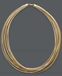 Strands of spun gold. This unique necklace highlights eight strands of gold tone silicone with a 14k gold clasp. Approximate length: 18 inches. Strands of spun gold. This unique necklace highlights eight strands of gold tone silicone with a 14k gold clasp. Approximate length: 18 inches.