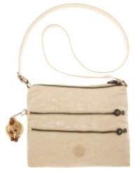 Zipped-up chic: with an adjustable strap and double front zip pockets, this Kipling handbag offers a refreshing combination of practical and fashionable. Zipped-up chic: with an adjustable strap and double front zip pockets, this Kipling handbag offers a refreshing combination of practical and fashionable.