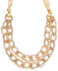 Decorative and dramatic. This beautiful bib necklace from c.A.K.e. by Ali Khan features faceted glass rondelle beading as well as a romantic satin ribbon. Crafted in gold tone mixed metal, it's sure to make a striking statement whenever you wear it. Approximate length: 24 inches. Decorative and dramatic. This beautiful bib necklace from c.A.K.e. by Ali Khan features faceted glass rondelle beading as well as a romantic satin ribbon. Crafted in gold tone mixed metal, it's sure to make a striking statement whenever you wear it. Approximate length: 24 inches.