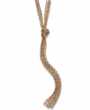 Let loose. Wispy chains knotted together in a lariat design create a confident, glamorous look on this Alfani necklace. Set in gold tone mixed metal. Approximate length: 24 inches + 3-inch extender. Approximate drop: 7 inches.