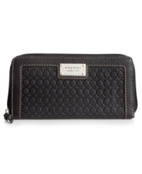A classic Nine West silhouette gets a modern makeover with signature-embossed pattern, detail stitching and shiny plaque accent. Precisely organized interior includes credit card pockets, bill slots and zip pocket to keep valuables safe and secure. A classic Nine West silhouette gets a modern makeover with signature-embossed pattern, detail stitching and shiny plaque accent. Precisely organized interior includes credit card pockets, bill slots and zip pocket to keep valuables safe and secure.