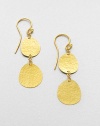 An elegant drop design with hammered 24k gold discs. 24k goldDrop, about .5Hook backImported 