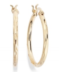 The perfect final touch. Giani Bernini's classic hoop earrings incorporate a diamond-cut design in 24k gold over sterling silver. Approximate diameter: 1 inch. The perfect final touch. Giani Bernini's classic hoop earrings incorporate a diamond-cut design in 24k gold over sterling silver. Approximate diameter: 1 inch.