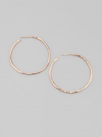 Slender hammered hoops of sterling silver and 18k gold, finished in the warm glow of 18k rose goldplating. An alloy of 18K gold and sterling silver plated with 18K rose gold Diameter, about 1¾ Post back Imported Slender hammered hoops of sterling silver and 18k gold, finished in the warm glow of 18k rose goldplating. An alloy of 18K gold and sterling silver plated with 18K rose gold Diameter, about 1¾ Post back Imported