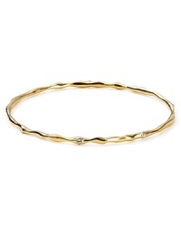 Simply elegant: this Nadri bangle features a subtly twisted silhouette and delicate cubic zirconia stations. Simply elegant: this Nadri bangle features a subtly twisted silhouette and delicate cubic zirconia stations.