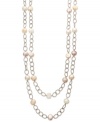 A long, luxurious layer. Pink and white cultured freshwater pearls (9-11 mm) adorn this oval link chain in polished sterling silver. Approximate length: 72 inches.