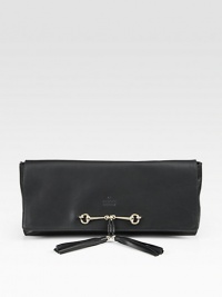 Leather flap design finished with iconic horsebit hardware and tassels. Flap with top zip closure14W X 6H X 2DMade in Italy Leather flap design finished with iconic horsebit hardware and tassels. Flap with top zip closure14W X 6H X 2DMade in Italy