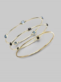 Five faceted blue topaz stones are sprinkled along a slender bangle of 18k gold. Blue topaz 18k yellow gold Diameter, about 2¾ Imported Please note: Bracelets sold separately. Five faceted blue topaz stones are sprinkled along a slender bangle of 18k gold. Blue topaz 18k yellow gold Diameter, about 2¾ Imported Please note: Bracelets sold separately.