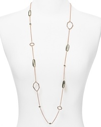 This Alexis Bittar link necklace introduces sculptural sparkle to your look, crafted of plated gold with striking crystal accents. This Alexis Bittar link necklace introduces sculptural sparkle to your look, crafted of plated gold with striking crystal accents.