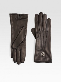 An elegant design in luxe leather with signature GG design.About 10 longDarted detailsLeatherDry cleanMade in Italy An elegant design in luxe leather with signature GG design.About 10 longDarted detailsLeatherDry cleanMade in Italy
