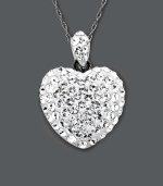 Step it up in the romance department. You'll adore Kaleidoscope's glamorous heart pendant that shines in clear crystals made with Swarovski Elements. Setting and chain crafted in sterling silver. Approximate length: 18 inches. Approximate drop: 7/10 inch. Step it up in the romance department. You'll adore Kaleidoscope's glamorous heart pendant that shines in clear crystals made with Swarovski Elements. Setting and chain crafted in sterling silver. Approximate length: 18 inches. Approximate drop: 7/10 inch.