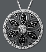 Spring is in full bloom. Kaleidoscope's unique flower pendant is adorned with black crystals made from Swarovski Elements. Set in sterling silver. Approximate length: 18 inches. Approximate drop: 2-8/10 inches. Spring is in full bloom. Kaleidoscope's unique flower pendant is adorned with black crystals made from Swarovski Elements. Set in sterling silver. Approximate length: 18 inches. Approximate drop: 2-8/10 inches.