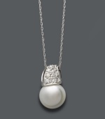 Give the gift of timeless beauty. This classic pendant by Belle de Mer defines elegance with a cultured freshwater pearl (9-10 mm) and sparkling, round-cut diamonds (1/6 ct. t.w.) in a 14k white gold wave setting. Approximate length: 18 inches. Approximate drop: 1/2 inch. Give the gift of timeless beauty. This classic pendant by Belle de Mer defines elegance with a cultured freshwater pearl (9-10 mm) and sparkling, round-cut diamonds (1/6 ct. t.w.) in a 14k white gold wave setting. Approximate length: 18 inches. Approximate drop: 1/2 inch.