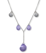 Chic combination. A subtle shade of gray complements the lovely lilac hue in Swarovski's Play Tanzanite Y pendant necklace. Crafted with sparkling clear Pointiage® crystals, its striking silhouette is derived from water droplets. Set in silver tone mixed metal. Approximate length: 15-7/10 inches. Approximate drop: 1-1/2 inches.