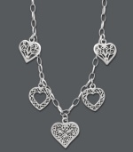 This Giani Bernini style is certain to capture your heart. For the free-spirited fashionista, five filigree hearts create an enchanting look you'll cherish forever. Crafted in sterling silver. Approximate length: 16 inches.