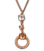 A design that speaks volumes about elegance -- this gold tone mixed metal pendant flaunts a cubic-cut clear Swarovski crystal on top. Followed by two Golden Shadow Swarovski crystals, the pendant ends with a ring of moonlight and golden shadow Swarovski crystals set in pavé. Approximate length: 15 inches. Approximate drop: 2 inches.