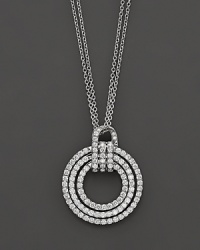 Diamond circle pendant in white gold with link chain. Diamond circle pendant in white gold with link chain.