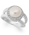 Perfectly polished. This exquisite ring combines a cultured freshwater pearl (7-1/2-8 mm), a halo of round-cut white topaz (1-1/10 ct. t.w.) and a unique setting in twisted sterling silver. Size 7.