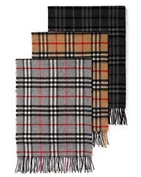 Scarf with signature check, made from the finest cashmere. Scarf with signature check, made from the finest cashmere.