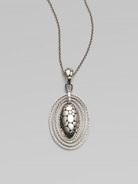 From the Kali Zen Collection. A graceful yet striking oval - with the Kali stepping-stone texture on the front, an open filigree back and rope chain edging - hangs from a sterling silver woven chain. Sterling silver Chain length, about 36 Pendant length, about 2½ Pendant width, about 1¼ Lobster clasp Made in Bali From the Kali Zen Collection. A graceful yet striking oval - with the Kali stepping-stone texture on the front, an open filigree back and rope chain edging - hangs from a sterling silver woven chain. Sterling silver Chain length, about 36 Pendant length, about 2½ Pendant width, about 1¼ Lobster clasp Made in Bali