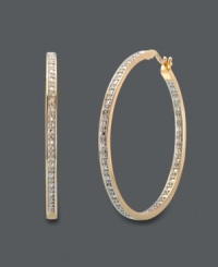 Stand out in a crowd. These large hoop earrings by Victoria Townsend are not for the shy. Crafted in 18k gold over sterling silver, these earrings sparkle with the addition of round-cut diamond accents. Approximate diameter: 1-5/8 inches. Stand out in a crowd. These large hoop earrings by Victoria Townsend are not for the shy. Crafted in 18k gold over sterling silver, these earrings sparkle with the addition of round-cut diamond accents. Approximate diameter: 1-5/8 inches.