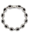 This Carolee bracelet styles your look with effortless elegance, accented by jet stone stations, specially faceted for added allure.