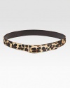 Leopard-print Italian hair calf reverses to smooth semi-gloss leather with brass hardware for an easy, multipurpose look. About 1¼ wide Nubuk calf lining Made in USA 