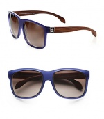 Lovely dark wood and skull plaques accent acetate frames for a warm and chic look. Available in black with grey gradient lens or blue with brown gradient lens. Logo temples100% UV protectionMade in Italy 