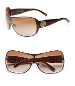 Sleek metal frames with logo accented acetate temples. Available in silver stingray with grey gradient lens or bronze with brown gradient lens. Logo temples100% UV protectionImported