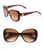 Simply chic acetate design with metal, cut-out logo temples. Available in tortoise with brown gradient lens or plum with purple gradient lens. Metal, cut-out logo temples100% UV protectionImported