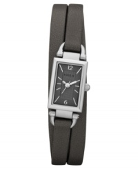 An original triple-wrap strap sets the tone for this delicate Delany collection timepiece from Fossil. An original triple-wrap strap sets the tone for this delicate Delany collection timepiece from Fossil.