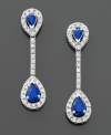 These luxurious drop earrings make a glam statement. Teardrop-cut sapphires (9/10 ct. t.w.) and round-cut diamonds (1/3 ct. t.w.) are set in 14k white gold. Drop measures 1-1/4 inches.