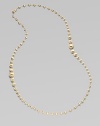 An elegant strand of brushed 18k yellow gold beads.18k yellow gold Length, about 36 Lobster clasp Made in Italy