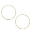 Forever stylish, forever chic. This pair of endless hoop earrings comes in 14k gold. Approximate diameter: 15 mm.